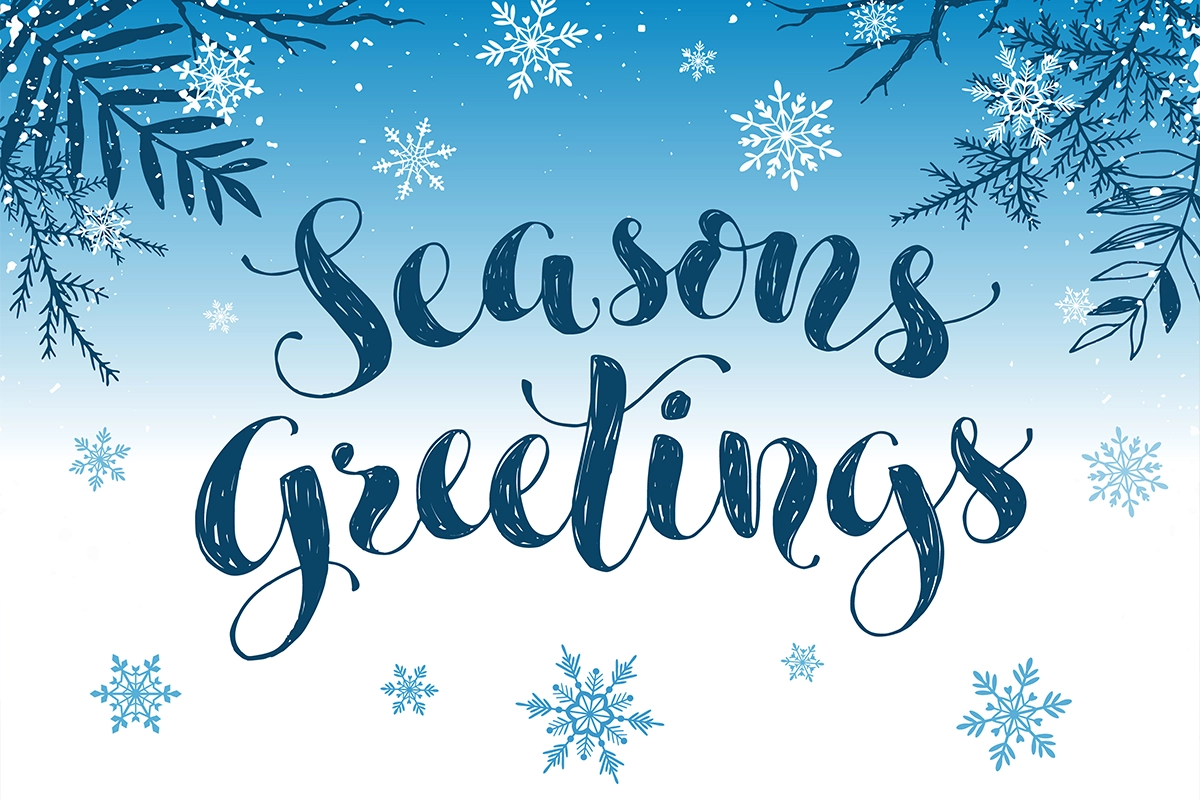 Seasons Greetings in blue text on a winter background